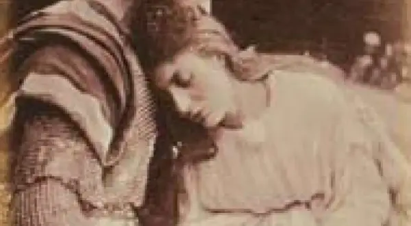 Portret Julii Margaret Cameron: kobieta opiera głowę na ramieniu mężczyzny w zbroi.